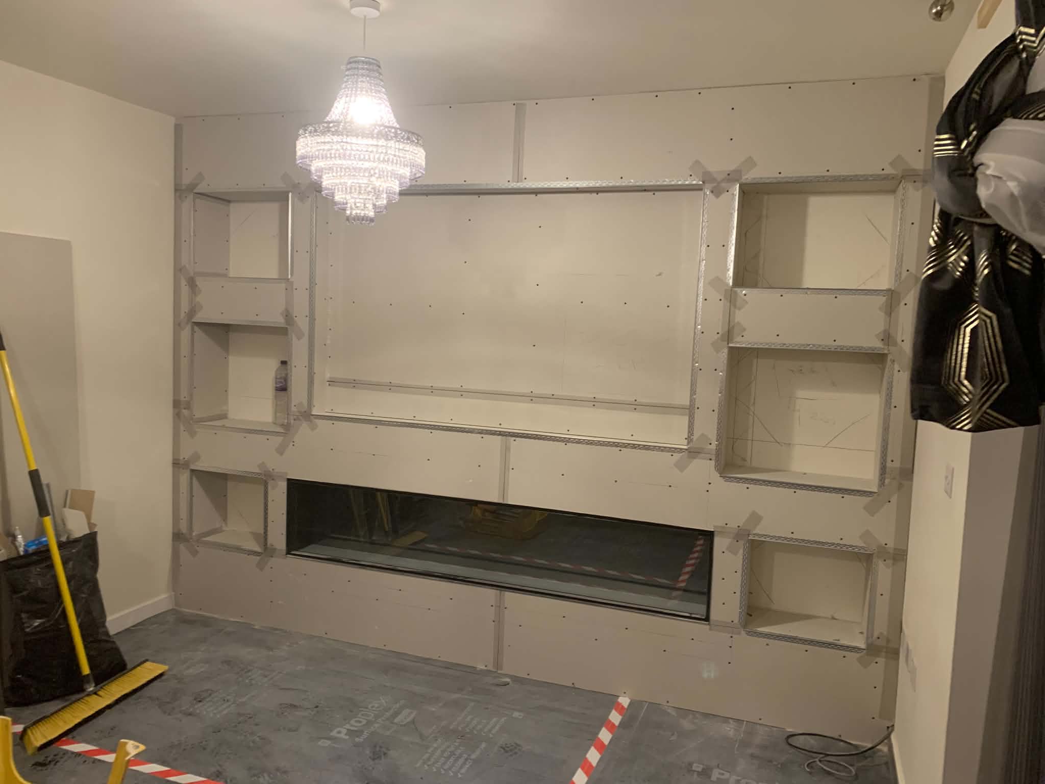 Corner Media Wall Ideas: What to Expect and How to Design One 2 integrated media wall and fireplace Media wall with metal frame and floating shelving units